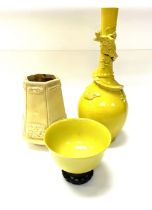 A yellow glazed Chinese porcelain bowl with underg