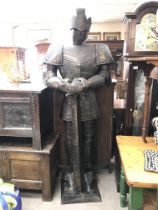 A large Tin Knight in armour, approximately 195cm. Postage category D