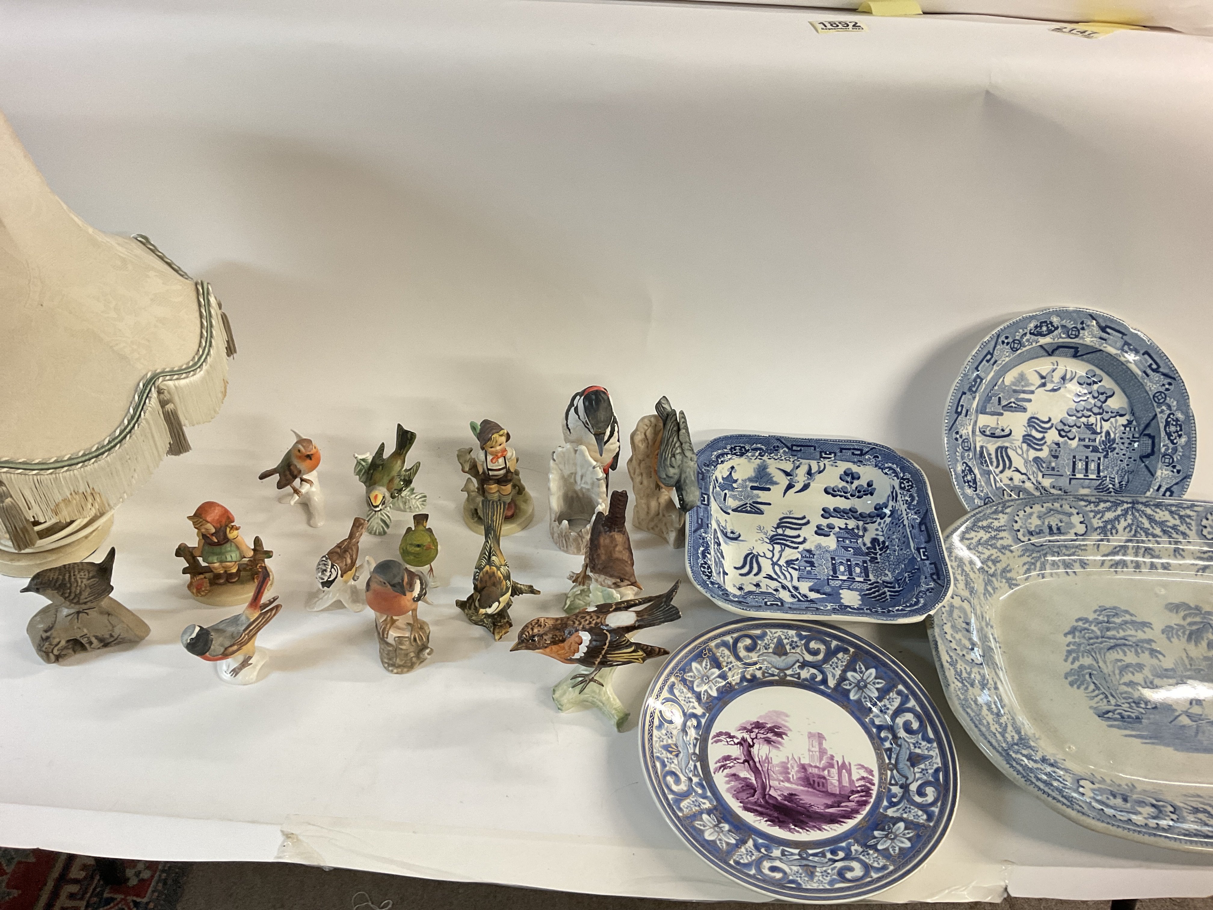 Collective lot of ceramics including Goebel figures a lamp which shows signs of extensive repair and