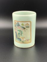 A small Chinese celadon glazed brush pot with 2 ha