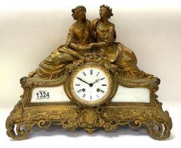 A French Gilt metal and Glass mantle clock, marked for Franjus, A Paris. H.34cm x W. 46cm.