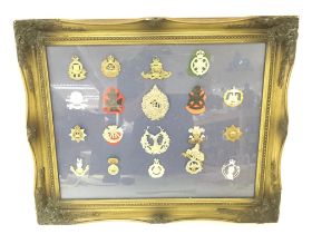 Cased Cap badges and a box of various cap badges-