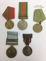 Five medals comprising a Korean UN medal, two Soviet medals, a British WW2 defence medal and a