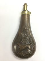 A god quality copper powder flask decorated with g