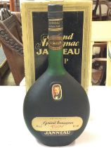 A boxed bottle of Grand Armagnac VSOP Janneau, pos