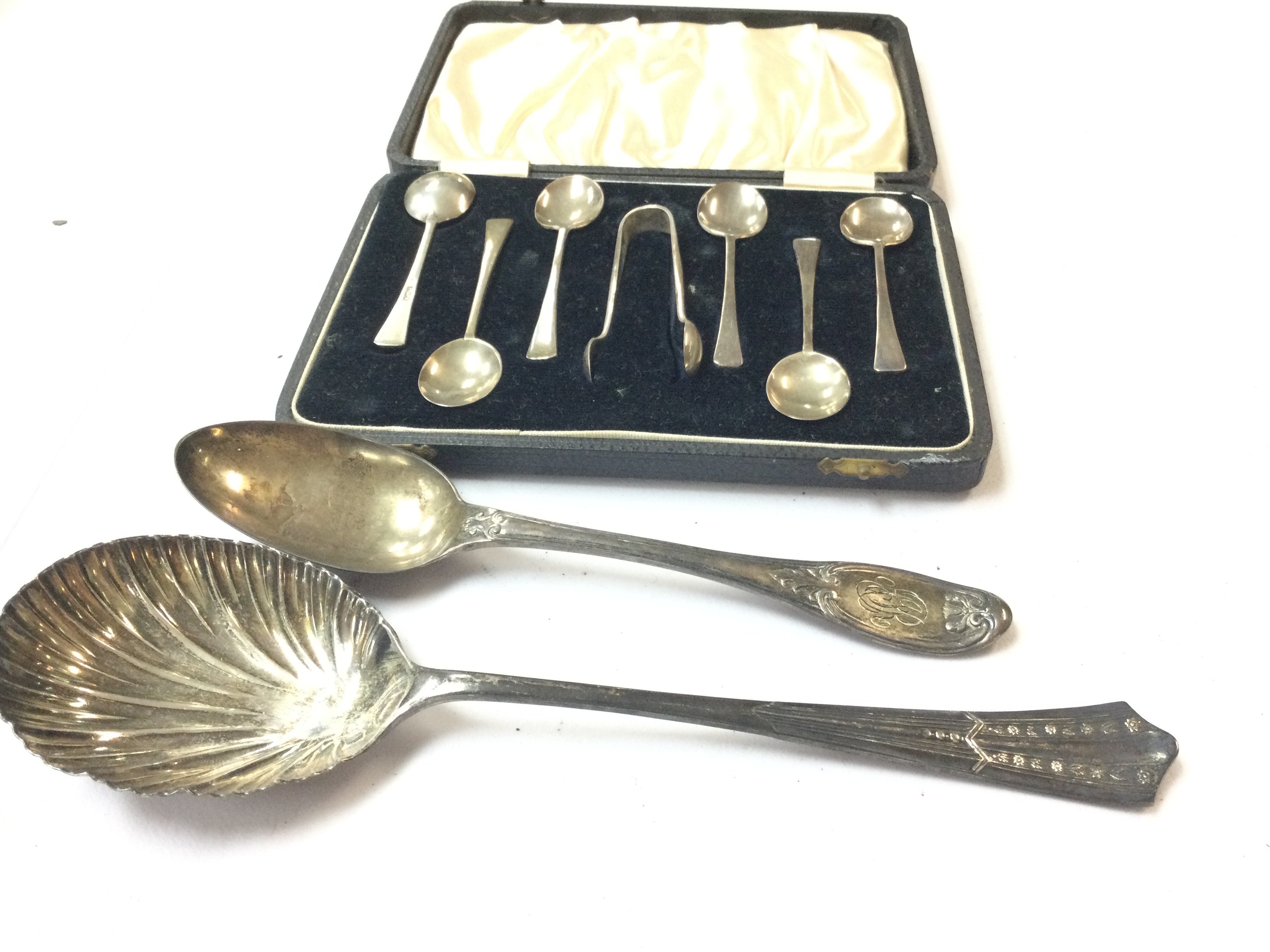Cased silver coffee spoons and two odd bigger silv
