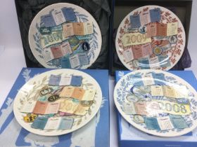 A collection of boxed and loose Wedgwood calendar plates. Shipping category D. NO RESERVE