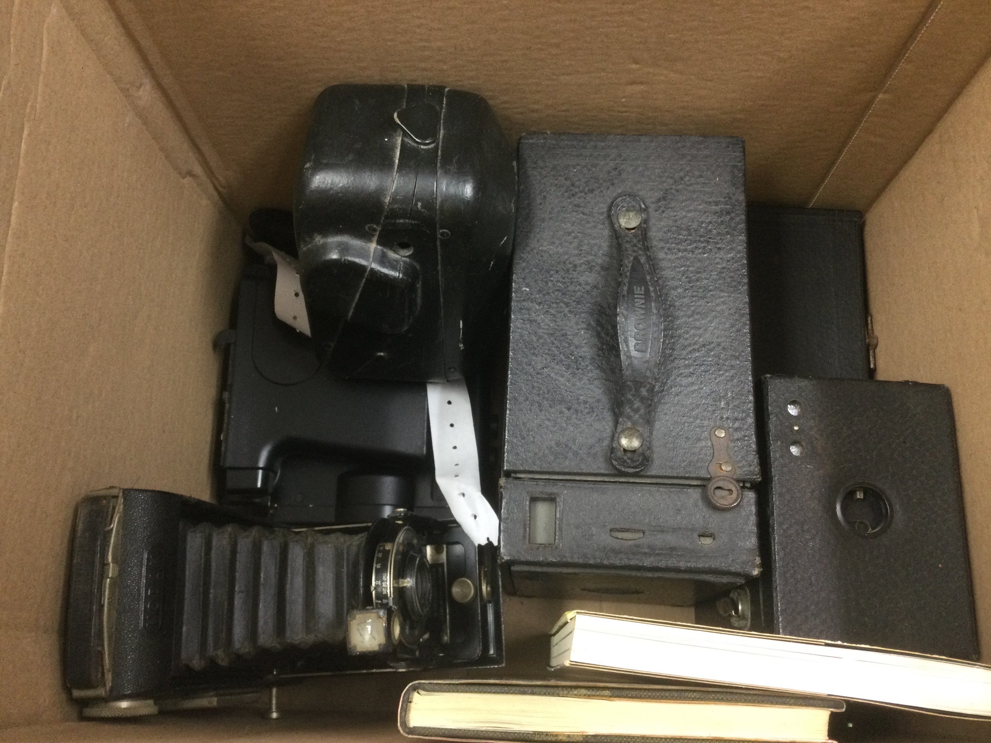 A box of vintage cameras including a Rolleiflex, Rolleicord, Kodak Six 20 and others. Shipping - Image 2 of 2