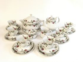 21 piece Chodziez tea set, comprising of 6 trios, a serving plate, a milk jug and a sugar pot.