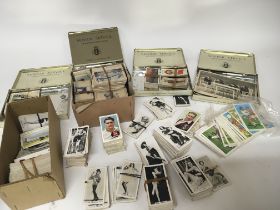 A collection of Vintage cigarette cards including