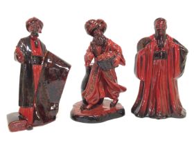 A collection of Royal Doulton Flambe figurines inc