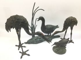 Four bronze figures of wild fowl, tallest approx 31.5cm. Shipping category C.