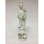 A Chinese white glazed figure Quan Yin 40 cm .