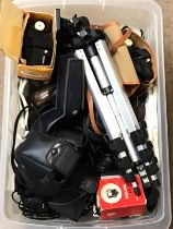 A collection of vintage cameras and equipment incl