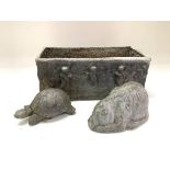 A cast lead planter together with a cast rabbit and tortoise. (D).