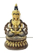 A small Tibetan gilt bronze Bodhisattva, 17cm.