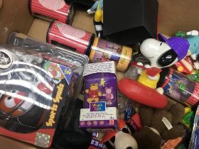 A collection of Disney and Warner Bros related items including poseabke friends and Pez