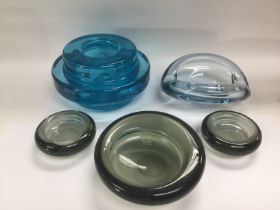 Five Holmegaard coloured glass items, largest diameter approx 16.5cm. Shipping category D.
