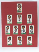 A mounted presentation of football cards signed by members of the England World Cup '82 squad.