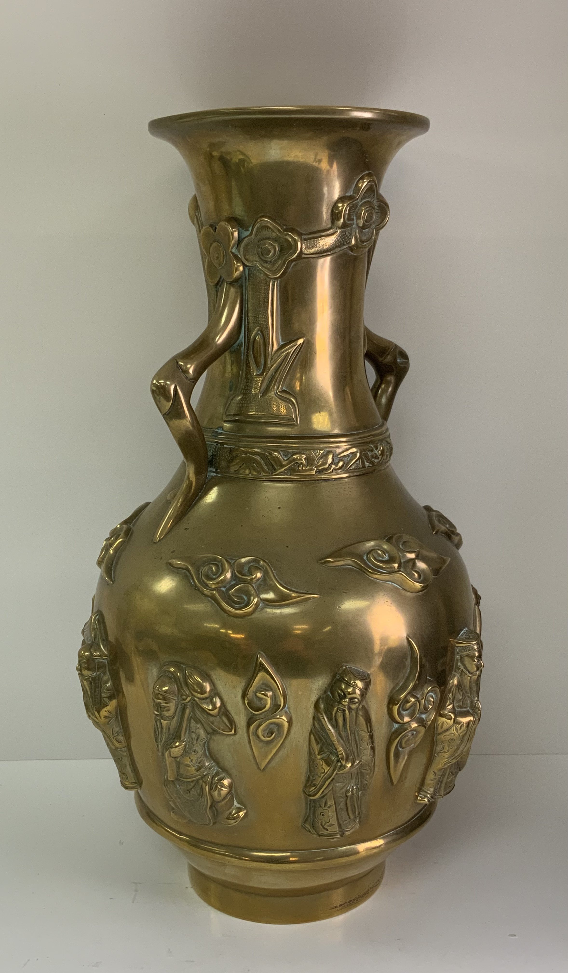 A 19th century Chinese cast bronze vase surrounded by 8 images of immortals. 39cm. - Image 3 of 4