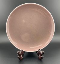 A Chinese monochrome porcelain dish with an under