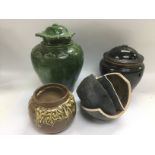 A box containing four Chinese pottery vases, a/f. Largest vase and cover approx height 25cm.