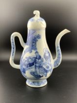 A Chinese blue and white porcelain teapot with a w