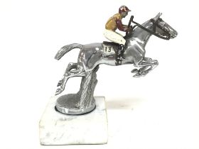 Chrome car mascot circa 1950s of a show jumping ho