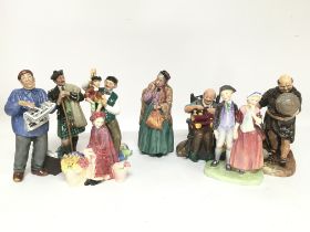 A collection of porcelain Royal Doulton figurines