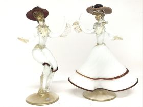 Pair of Murro figurines, 25cm tall. postage catego