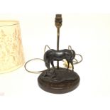 A bronze lamp with horse and foal. Approximately 35cm high and 23cm wide. Postage C.