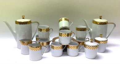 A German white and gilt porcelain coffee set. (D). NO RESERVE