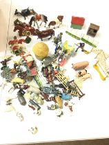 A collection of vintage Britains farm toys and oth