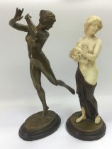 Two bronzed Art Deco style figures of nude and semi clad maidens, tallest approx 34cm. Shipping