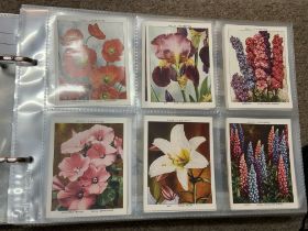 An Album with of sets of large cigarette cards. NO RESERVE