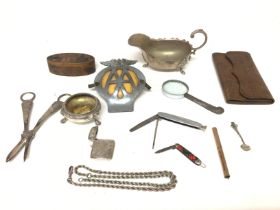 A collective lot including silver Vesta a silver spoon an AA badge rope chain etc. Postage B