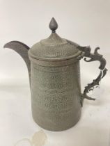 A large 19th Century Islamic copper water jug with