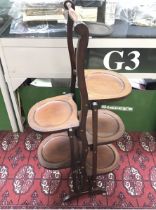 An oak cake stand , 92 cm tall. Postage category D