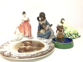 A collection of porcelain figures including Royal