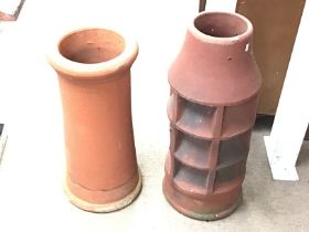 Two terracotta chimney pots. 63x28cm and 74x28cm approximately Postage D