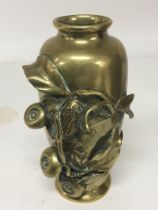 A Japanese late 19th Century brass vase with raised frog and foliage decoration height 17cm. NO