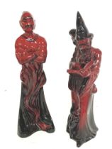 A pair of Royal Doulton porcelain Flambe figurines including The Genie HN 2999 & The Wizard HN 3121.