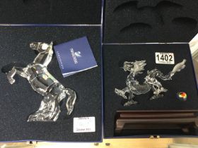 Two Swarovski figures including rearing horse and