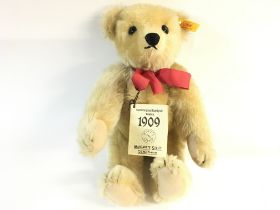 A Steiff 1909 replica teddy bear. Postage B NO RESERVE