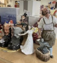 A collection of Royal Doulton Porcelain figures in