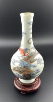 A small Chinese white porcelain bottle bottle vase