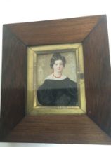 A Victorian Rosewood framed portrait miniature of a young lady with black dress. 8x7cm