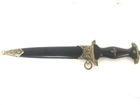 A replica of a German SA dagger with scabbard. 36c