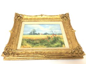 A framed pictures of an Essex landscape by Christopher Osbourne. 38x32cm. Postage D.