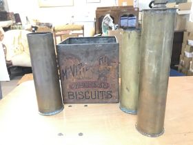 A vintage Mcvities biscuit tin and shell cases. Po